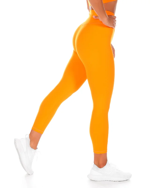 7-8-cross-over-leggings-bright-orange