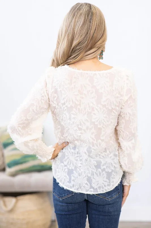 ivory-textured-floral-smocked-cuff-top