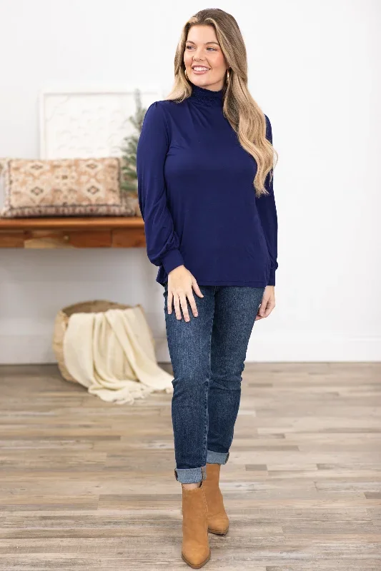 navy-smocked-turtleneck-top